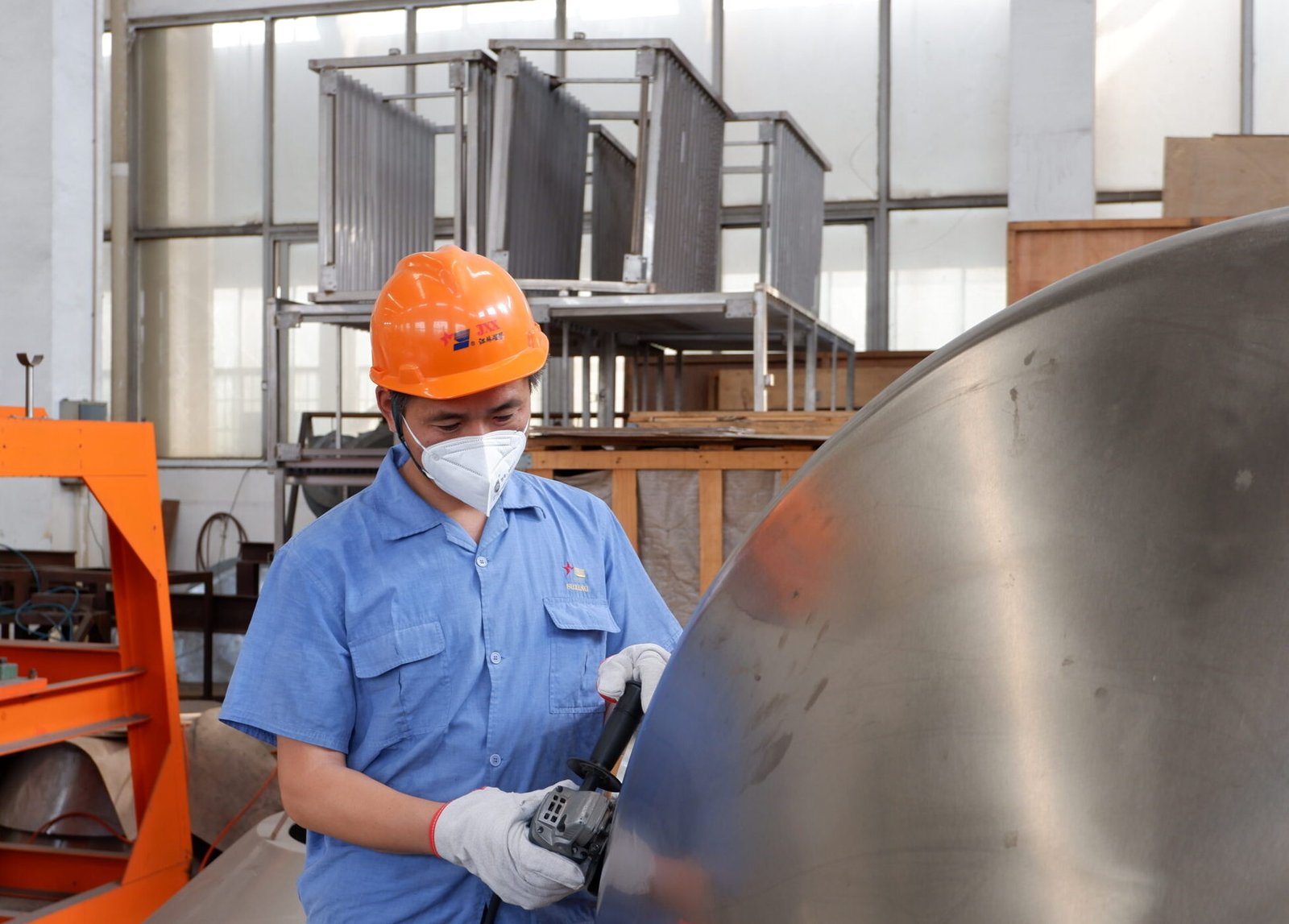 Stainless steel fabrication and assembly for a double cone vacuum dryer