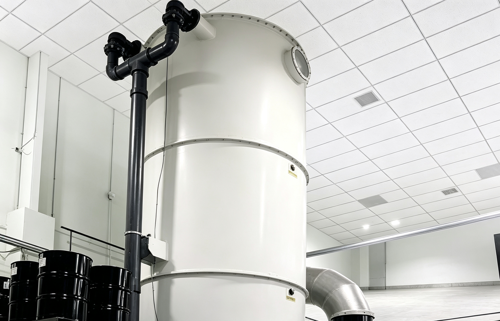 Enclosed vapor handling system for industrial dryer