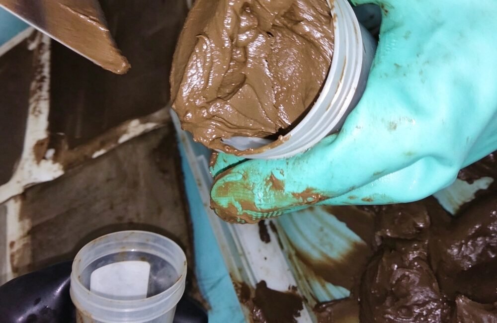 Press cake mixed with recovered solubles